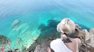 A cute girl passionately sucks dick on the beach