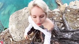 A cute girl passionately sucks dick on the beach