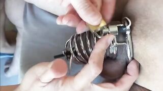 Femdom milking with a powerful vibrator and chastity device for intense pleasure