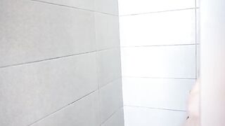 My petite step sister has a shower and plays with her pussy