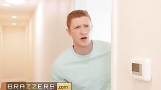 Mellanie Monroe calls her stepson to help her with laundry rack setup