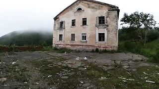 An exhibitionist girl is walking through abandoned buildings with her hot GF