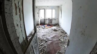 An exhibitionist girl is walking through abandoned buildings with her hot GF