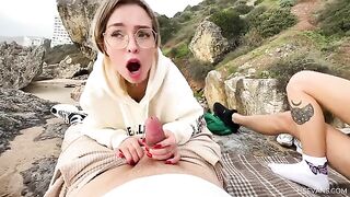 Two young girls are having fun with a man on the beach. It's their vacation
