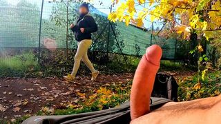 A pervert flashes his dick in the park and a horny milf follows him