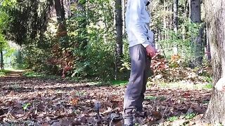 A pervert flashes his dick in the park and a horny milf follows him