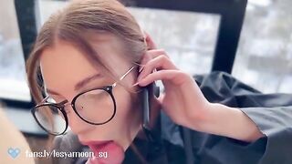 A small whore talking on the phone with her husband while being fucked by a friend