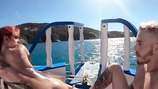 A couple has sex on a boat in the ocean, oiled up and very naughty