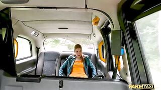 A sexy passenger, the stunning redhead Kiara Love, squirts on the Fake Taxi driver's dick