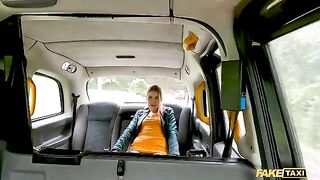 A sexy passenger, the stunning redhead Kiara Love, squirts on the Fake Taxi driver's dick