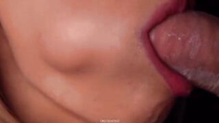 Horny babe sucks a dick through a condom and gets cum in her mouth. ASMR