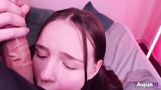A cute schoolgirl took a big cock into her mouth and swallowed it completely