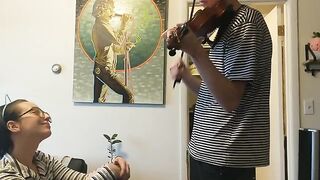 The couple was interrupted while trying to practice violin together
