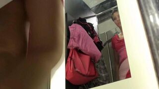 Spying for a girl in the changing room of the shop is not allowed