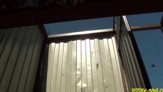 A girl has sex in the cabin on the beach and gets surprised