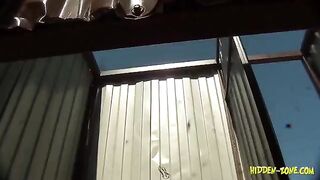 A girl has sex in the cabin on the beach and gets surprised