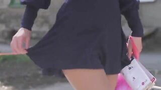 A very beautiful girl appears on camera wearing only stockings and nothing more