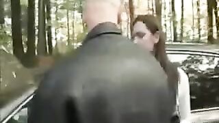 A woman was placed on the car's bonnet and started to tear her