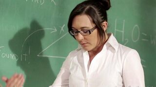 A girl is fucking with her teacher at her table