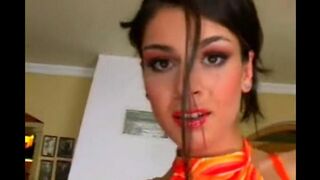 Beauty masturbates her pussy in a leather chair