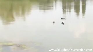 Nude beauty fucks with her head on the pier