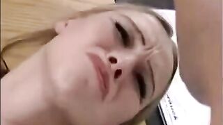 A girl is being fucked by a hand with a member at the same time