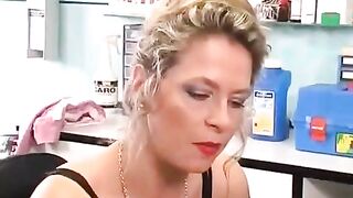 A woman with a clit piercing plays with a large toy in her pussy