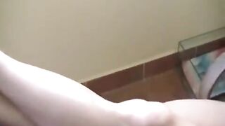 A girl has a smoke and burns herself, no man