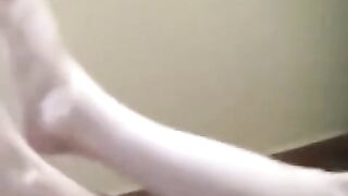 A girl has a smoke and burns herself, no man