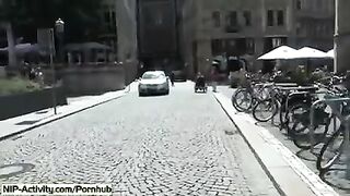 The girl has a naked walk in the city