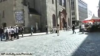 The girl has a naked walk in the city