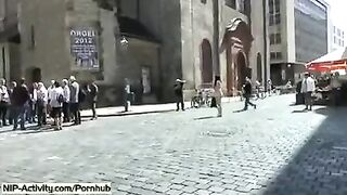 The girl has a naked walk in the city