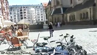 The girl has a naked walk in the city