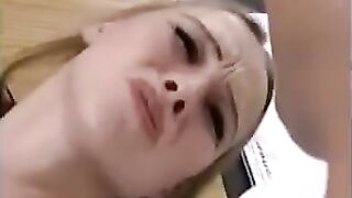 Cute girl in stockings and pantyhose tries fisting for the first time