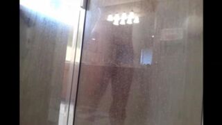 The guy washed himself in the shower, not suspecting a camera