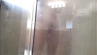 The guy washed himself in the shower, not suspecting a camera
