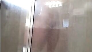 The guy washed himself in the shower, not suspecting a camera