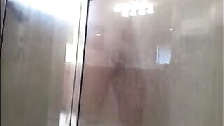 The guy washed himself in the shower, not suspecting a camera