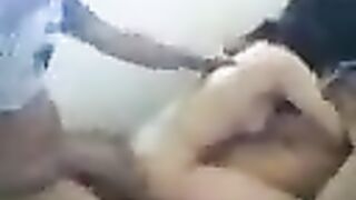 An Asian girl has sex with two guys in a steamy threesome