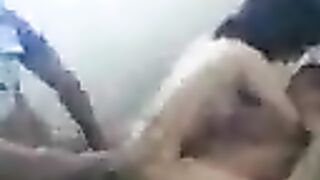 An Asian girl has sex with two guys in a steamy threesome
