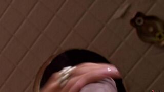 Beauty gave a blowjob through the hole in the toilet