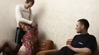 A mature woman fucked by her son and his friend in the hotel room
