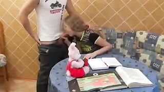 A cute girl is fucking with boyfriend instead of doing lessons