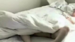 A hidden camera secretly captures intimate moments in the bedroom