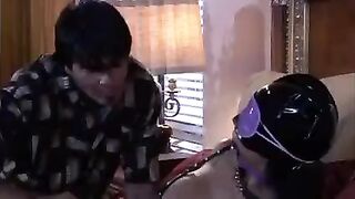 The beautiful woman plays a BDSM game with her lover