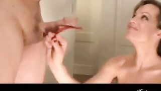 A woman with big tits demonstrates her powerful sucking skills