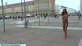 Naked chick went for a walk on the city streets and got caught