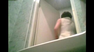 Hidden camera in the toilet bowl with a graduate student
