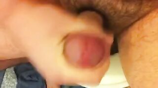 A young model fingers her dick in front of a webcam in a private setting