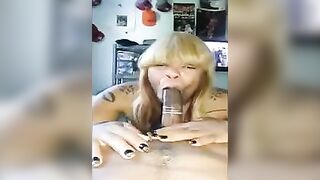 A black woman took a big dick in her mouth wrapped with condom